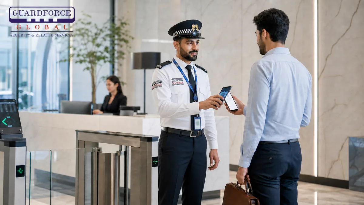 Guardforce security officer checking visitor access at a Dubai commercial building
